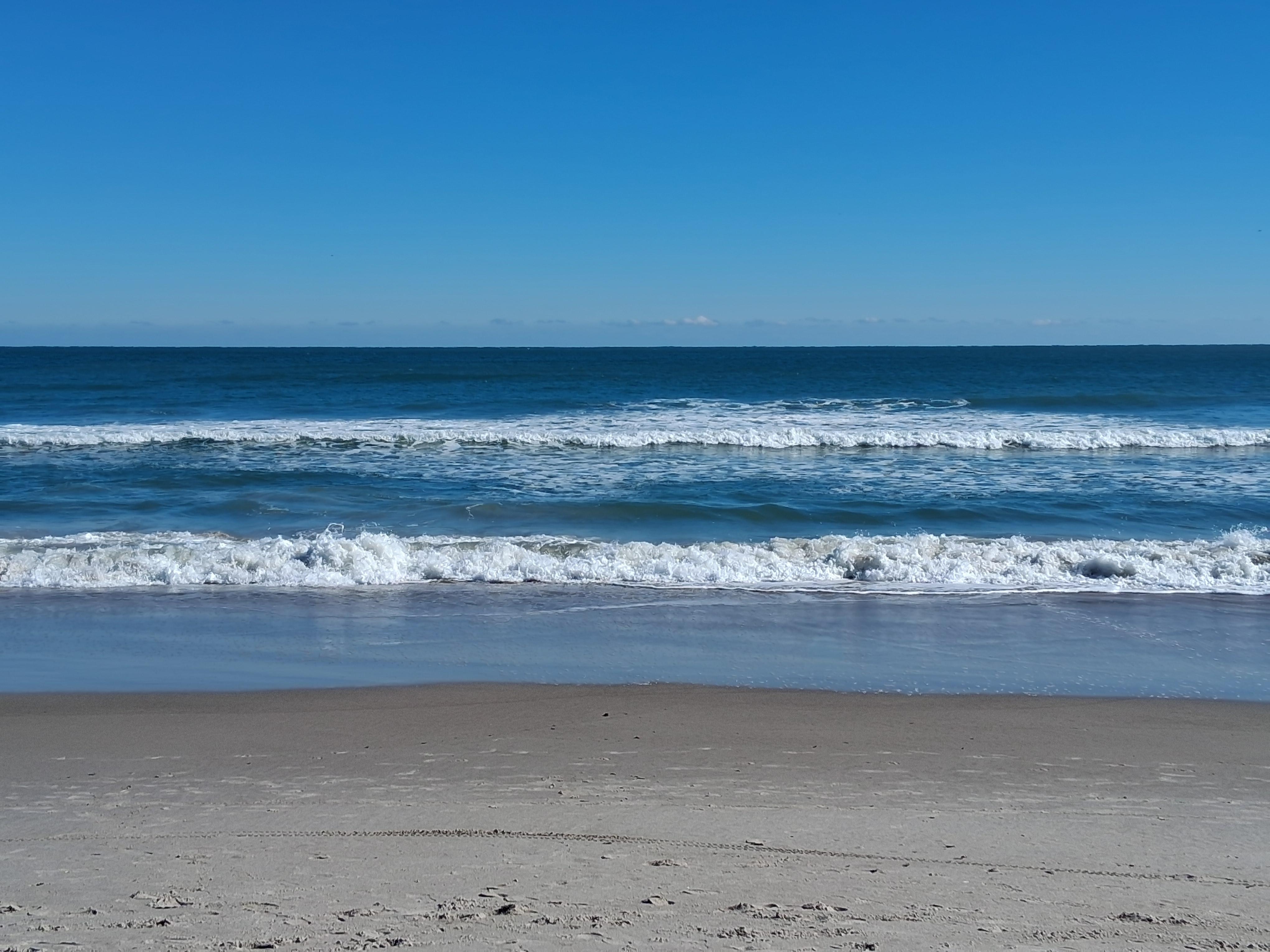 Beautiful clean Beach right outside the hotel near the pool and Bar 