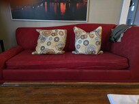 Sofa does not support cushion on lower side.