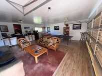 The unit has a very large living room/kitchen combo. It is all in a converted garage but very comfortable.