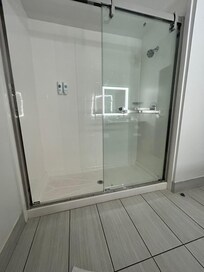 Shower is very roomy, very nice.