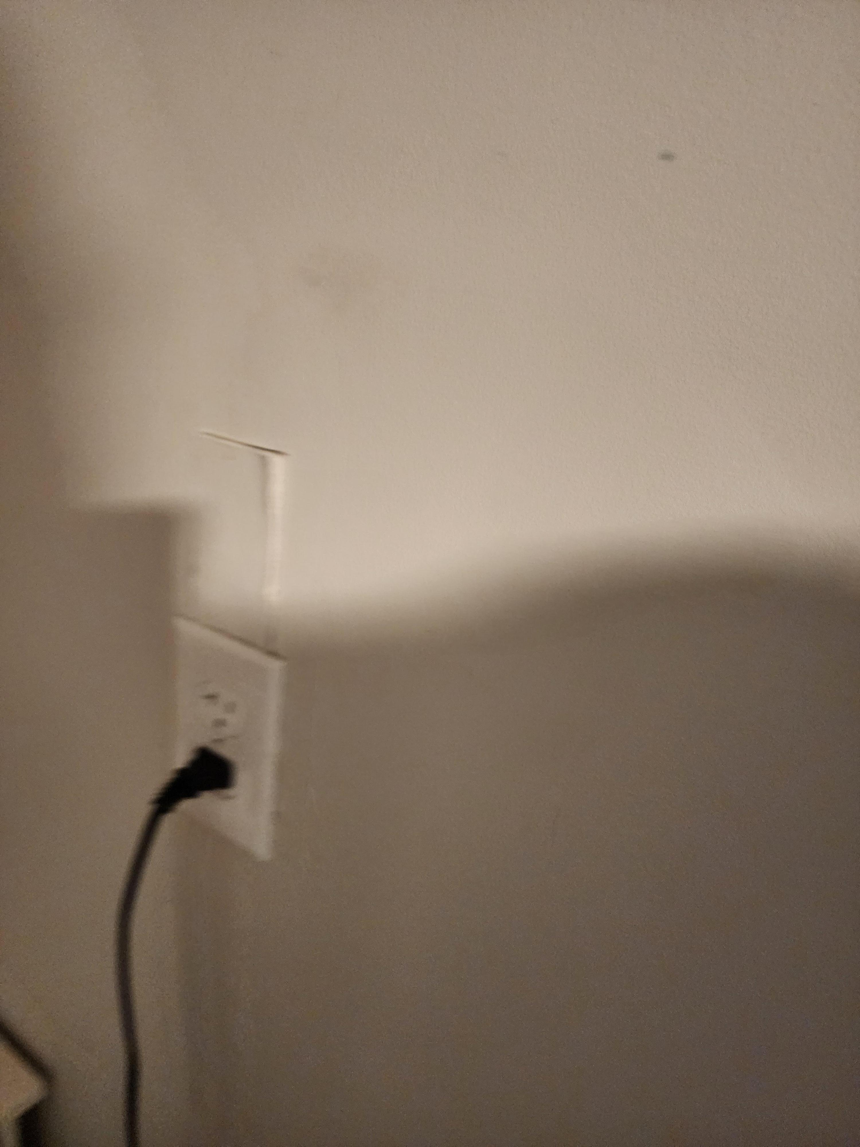 Looks like they made a hole then just placed the piece back it 