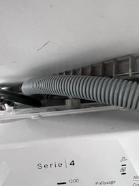 Washing machine discharge hose not connected, no place to discharge either