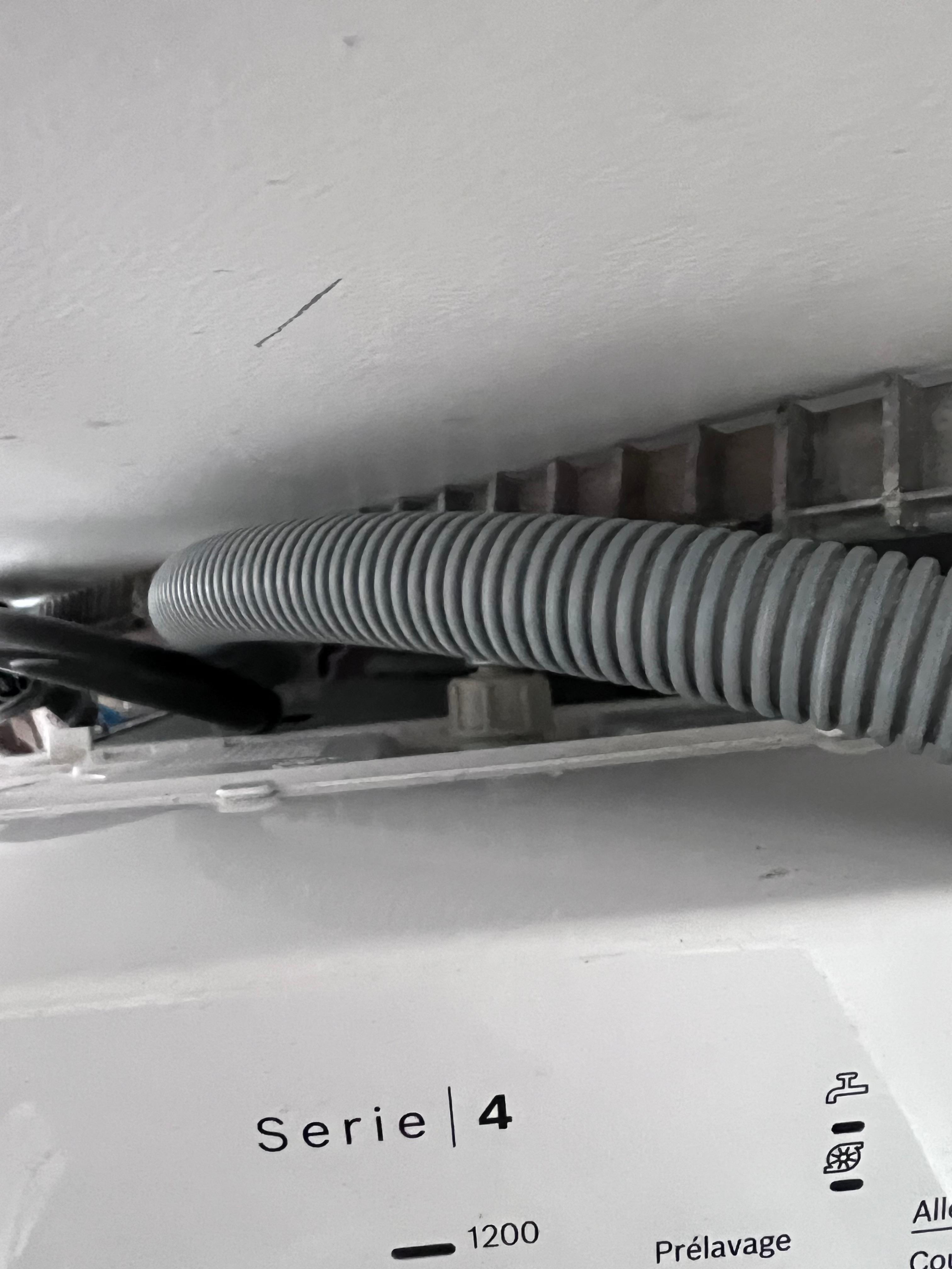 Washing machine discharge hose not connected, no place to discharge either