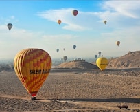 Watching the hot air balloons land in the morning