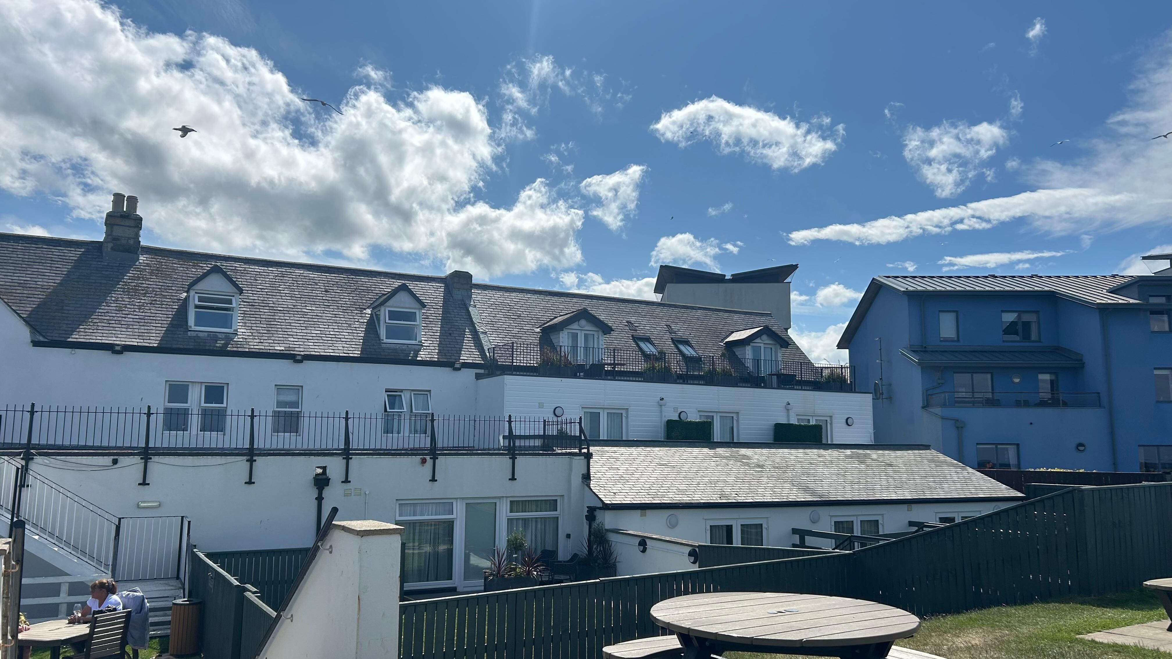 Looking up at hotel from garden area 
