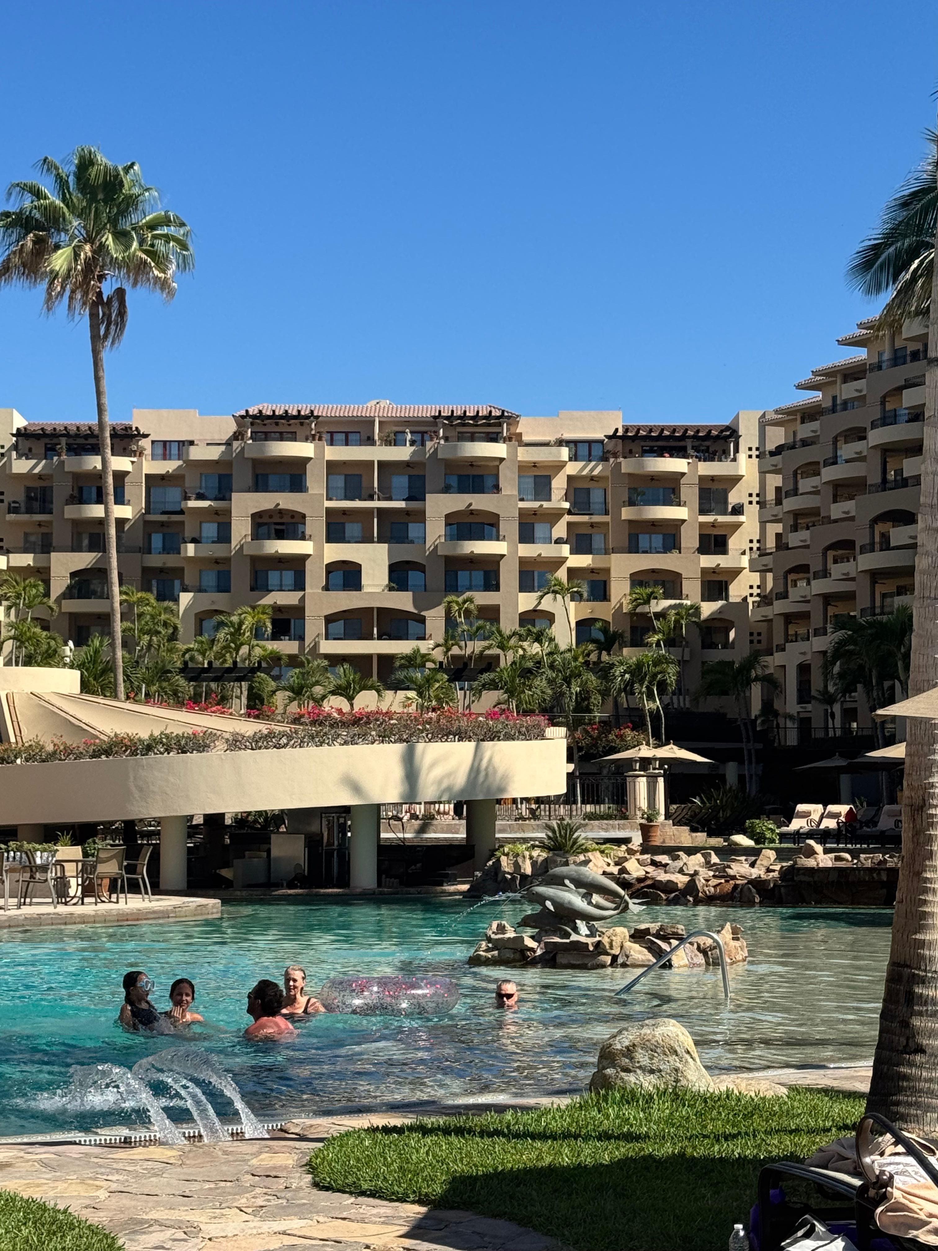 view of the pool coming in from the beach