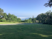 view from our back porch, early morning with clouds still low