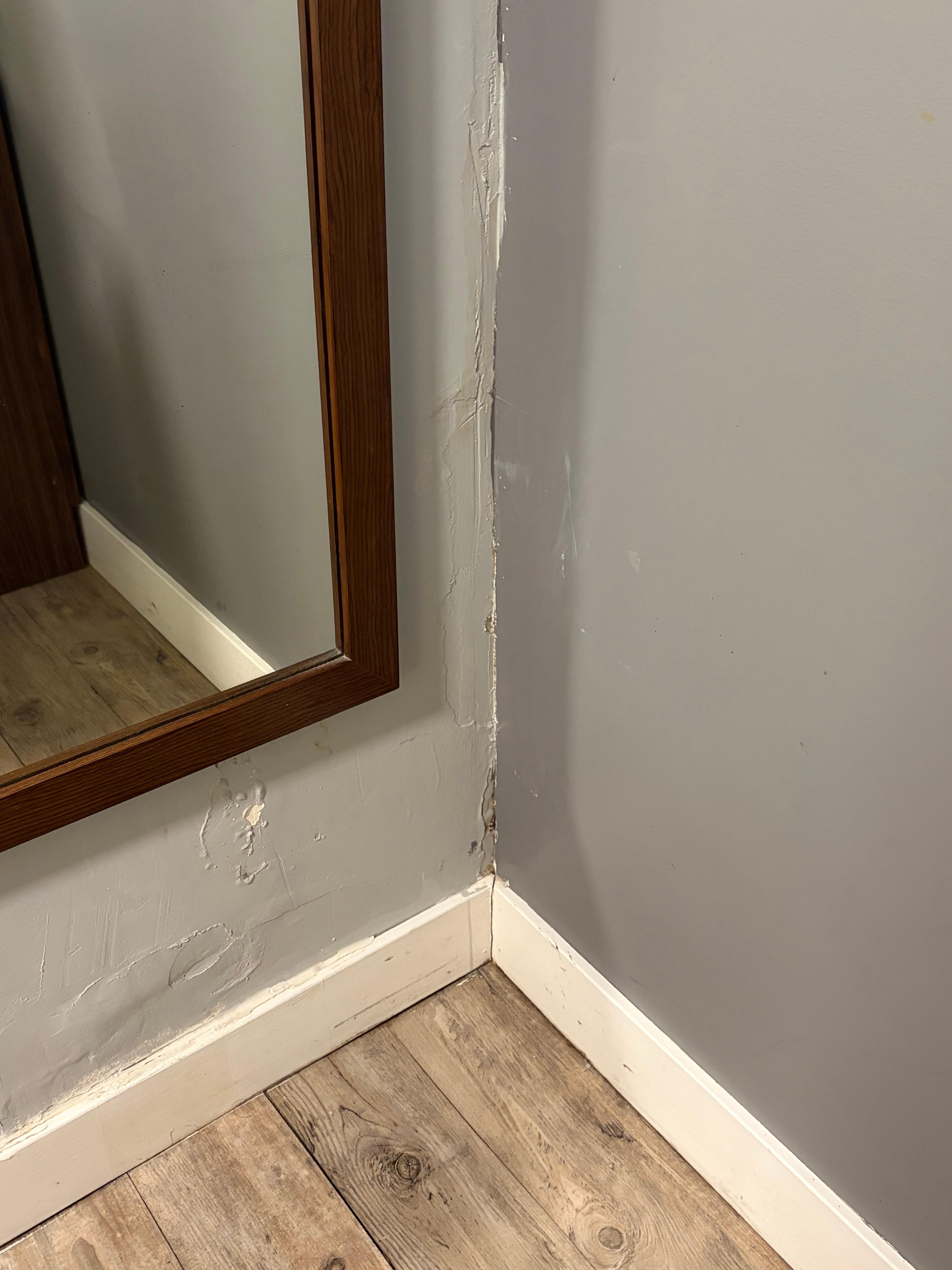 Water damage to the corner of the room