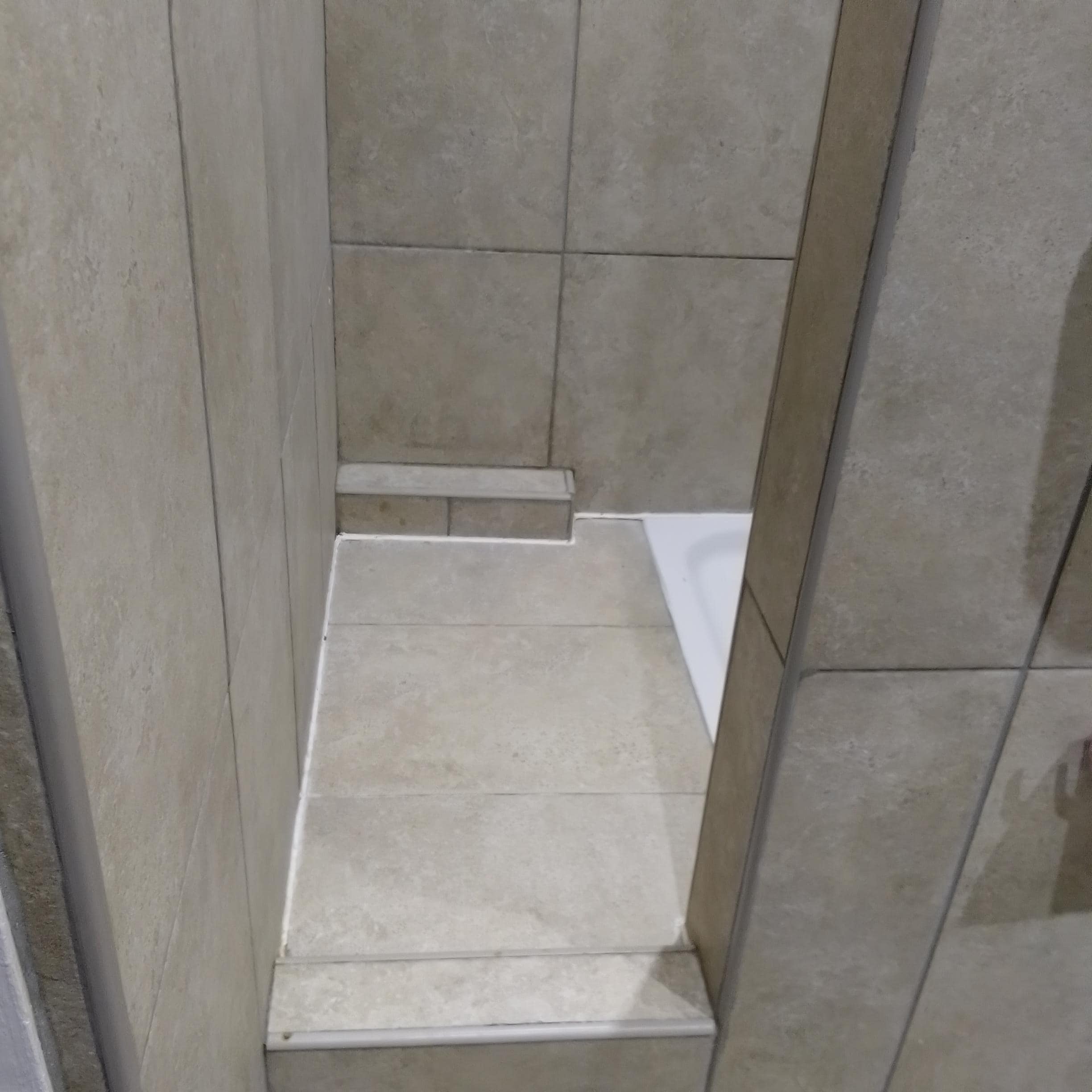 Narrow entrance to shower 