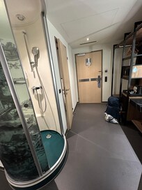 Shower cylinder opens next to sleeping quarters