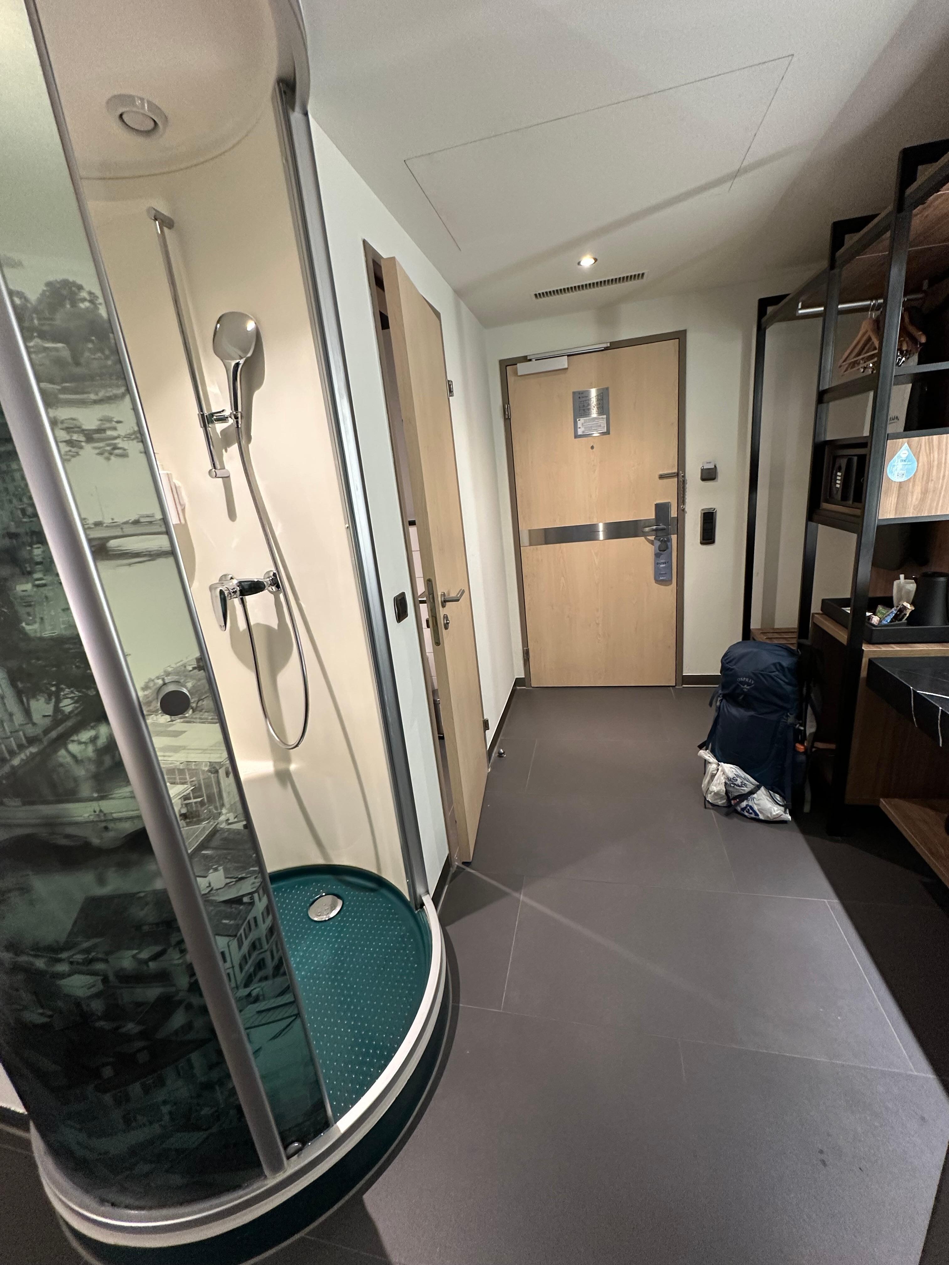 Shower cylinder opens next to sleeping quarters 