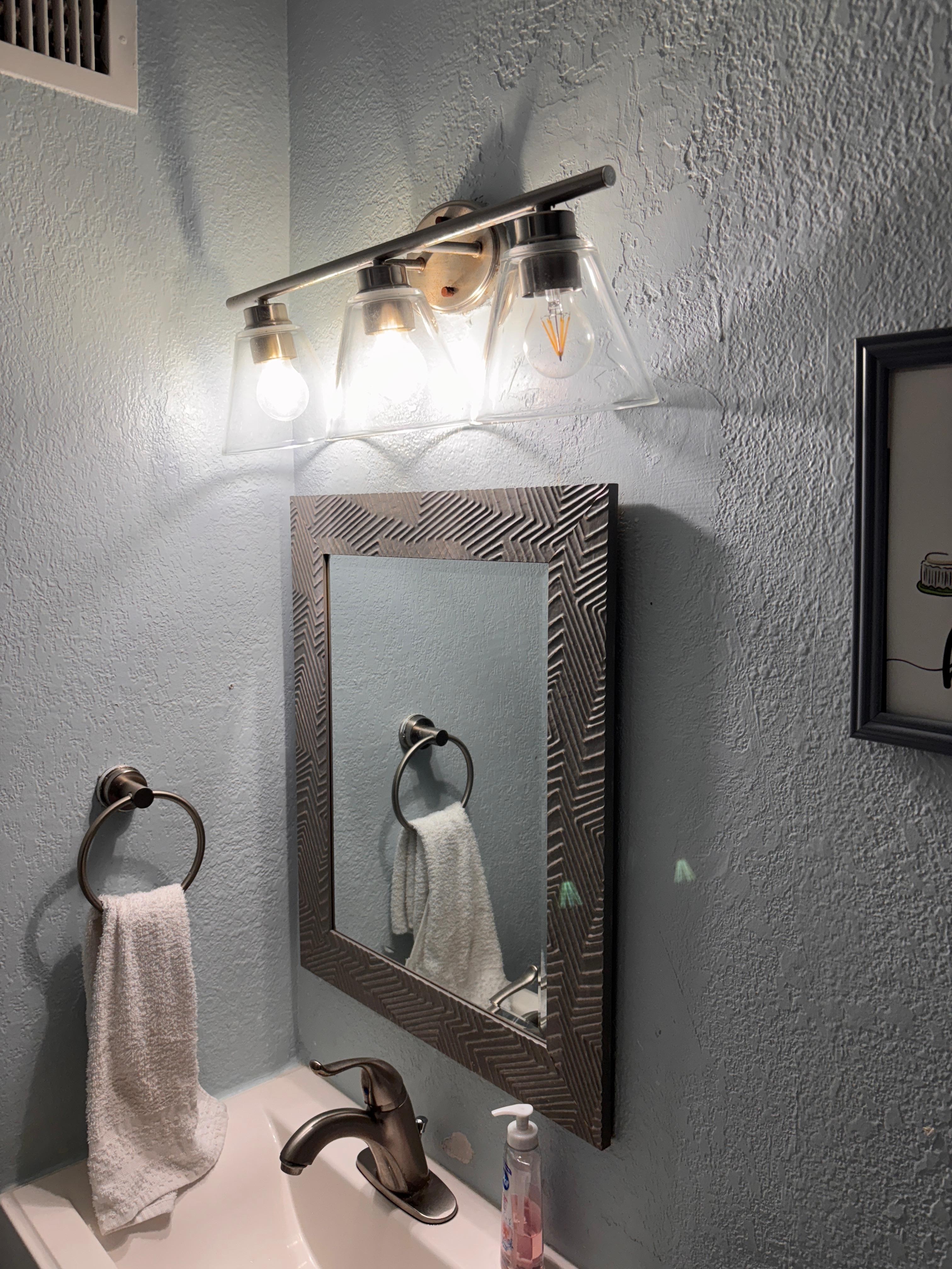 Missing lightbulbs in multiple light fixtures. 