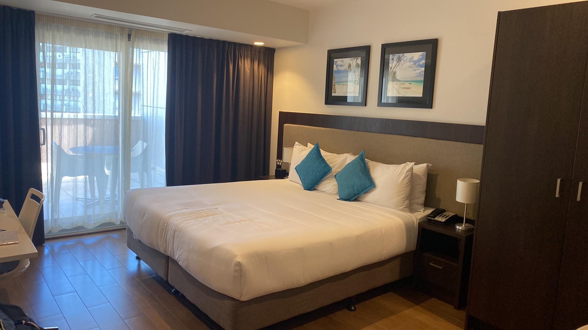 Bedroom with a view of the city