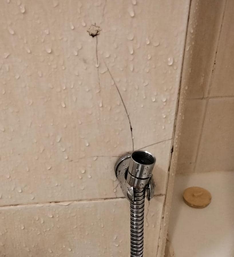 Health faccet and tile broken