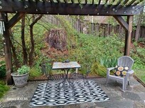 Outside patio- so pretty with a little stream running by. The only problem was it was pouring rain and we couldn't use the space.