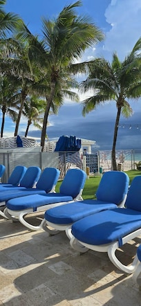 Wet lounging chairs and missing side tables.