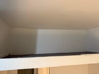 The loft where the sofa is supposed to be