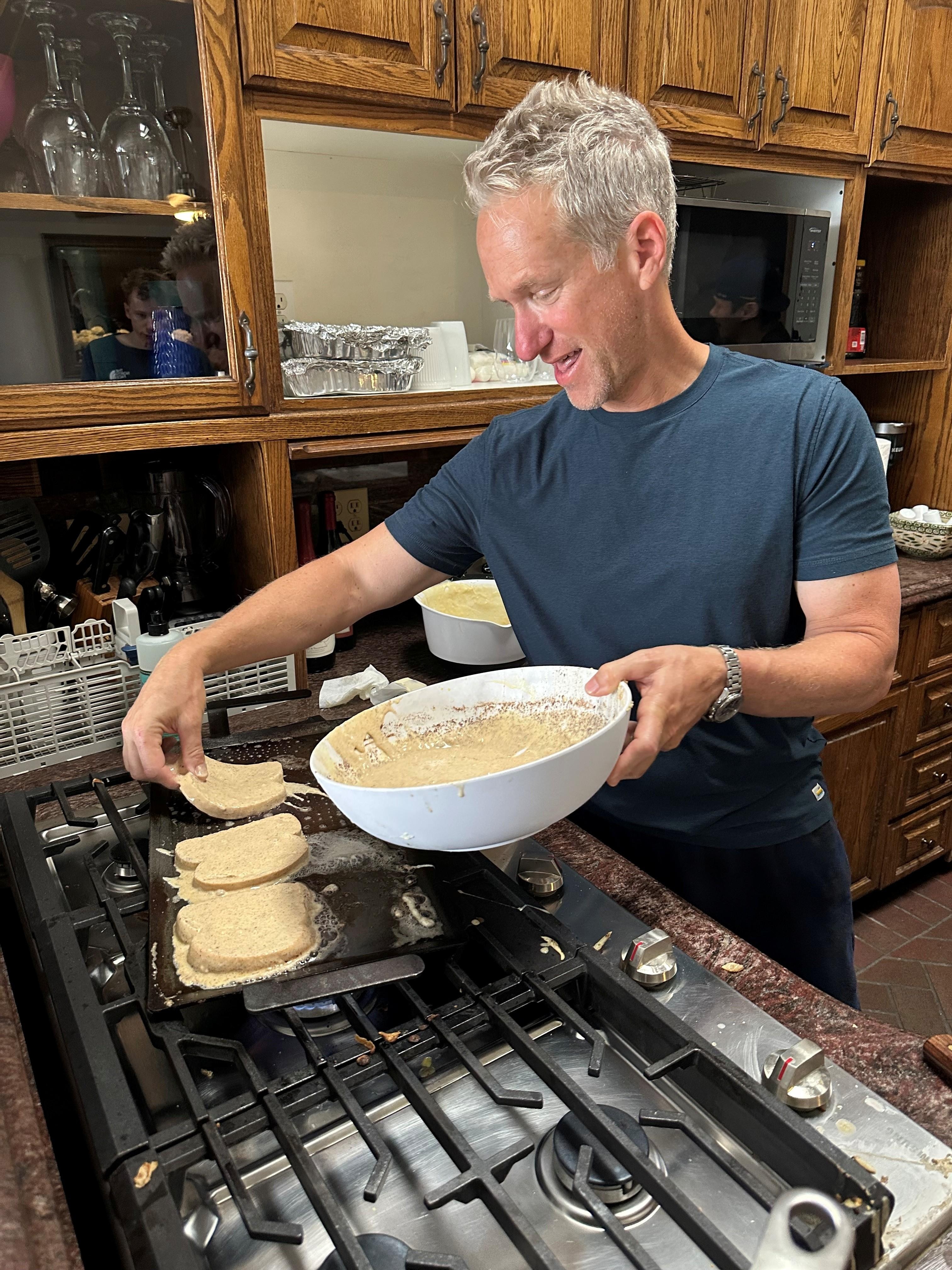 My brother cooking a pancake breakfast on our first morning. 
