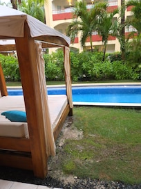 Personal backyard bed and swim-up.
