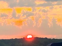 Sunrise from the living room of lake house