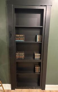 What’s behind the bookcase?