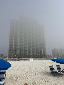Beach view looking back at condo on a foggy morning