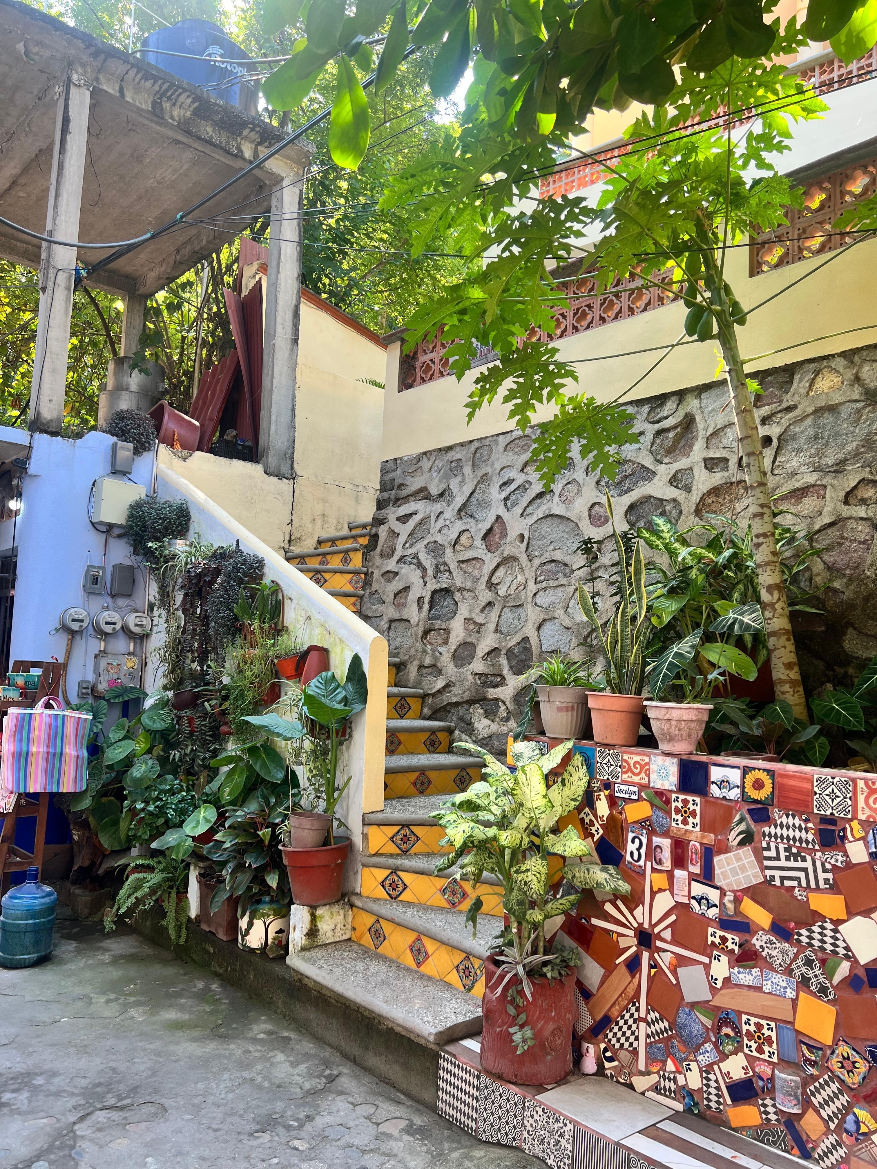 Stairs leading up to the house with candy shop just to the left!