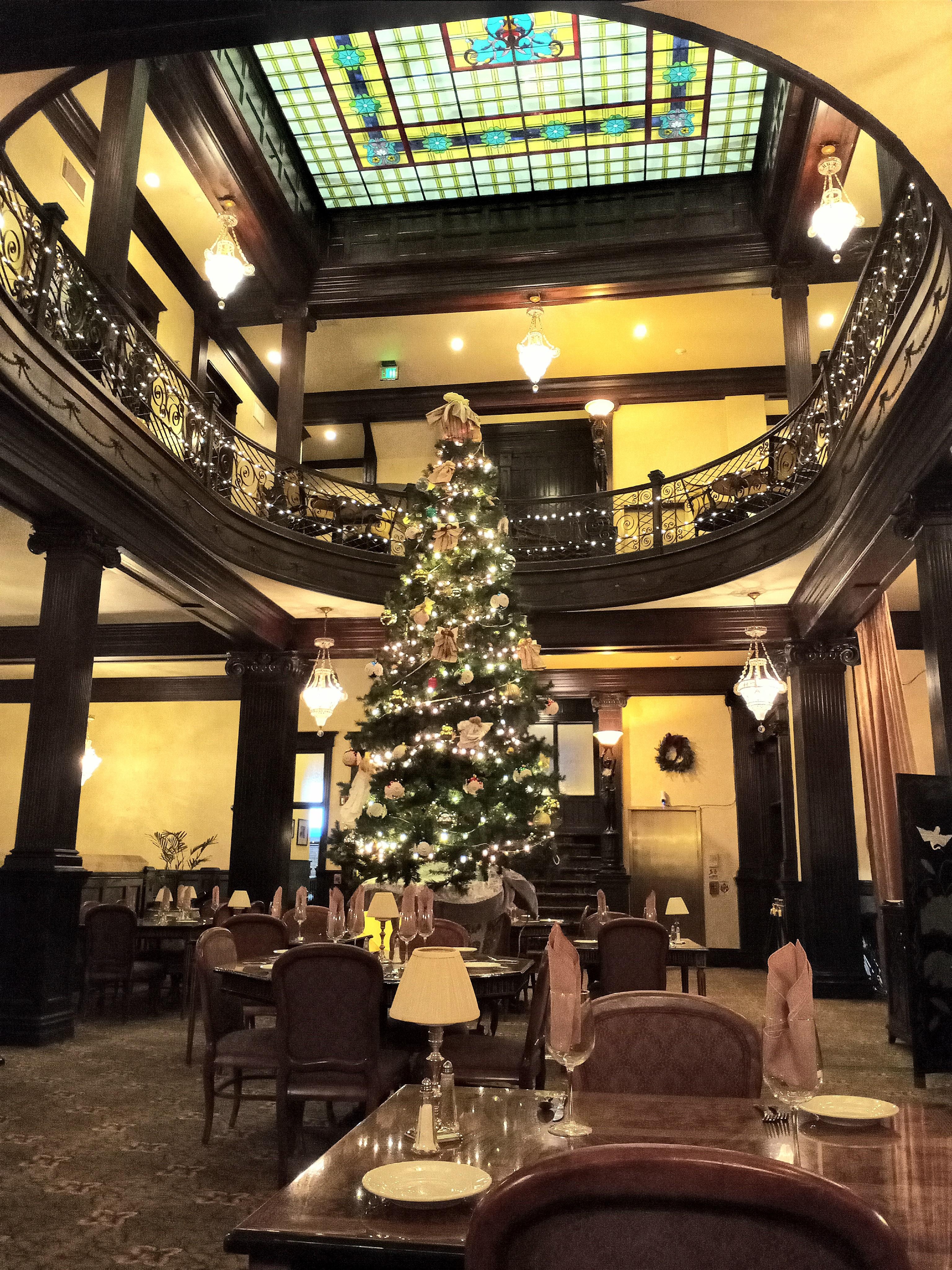 Christmas decorations in the restaurant. Notice the stained glass ceiling. 