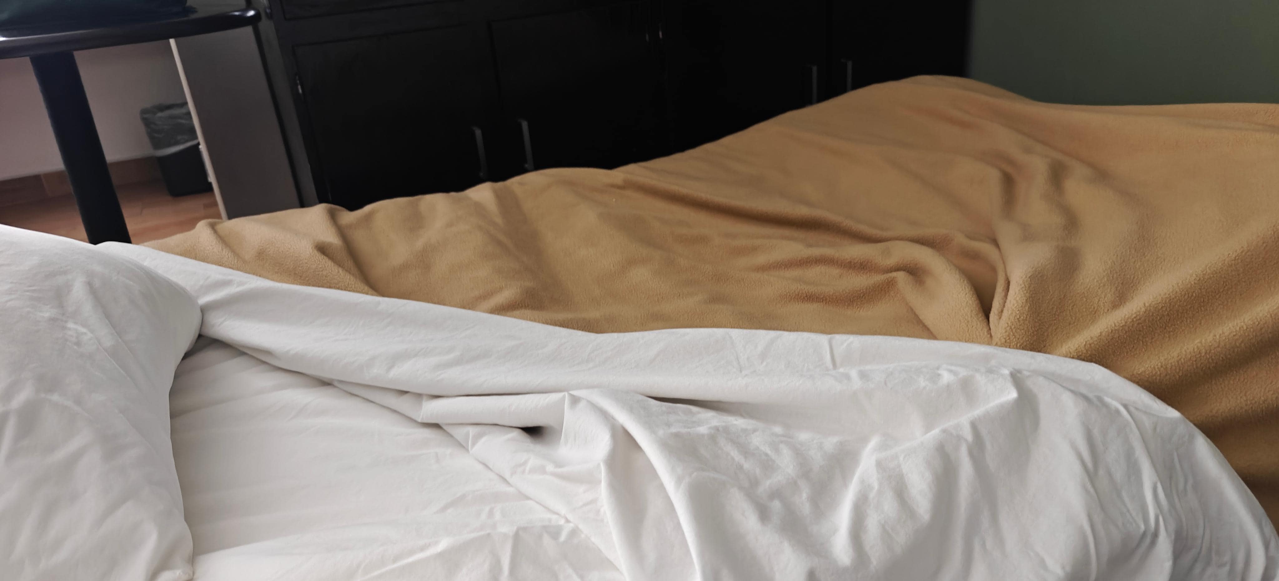 Twin bed completely bowed in the middle from being worn out