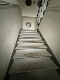 First flight of stairs upon entry