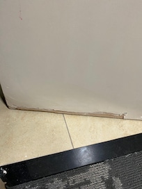 Water damage on bathroom door