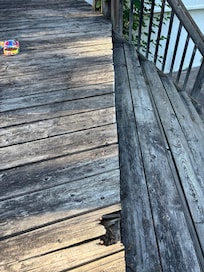 Deck going to the pool. Very bad very dangerous a lot of nails. Needs to be completely redone.