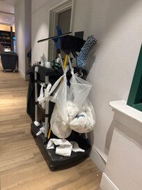 Trash cart in hallway