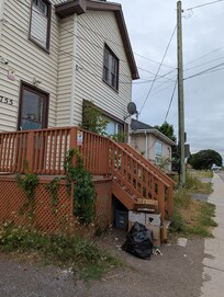 An outside photo. It was "trash" day but the unsecured trash ended up all over the property.
