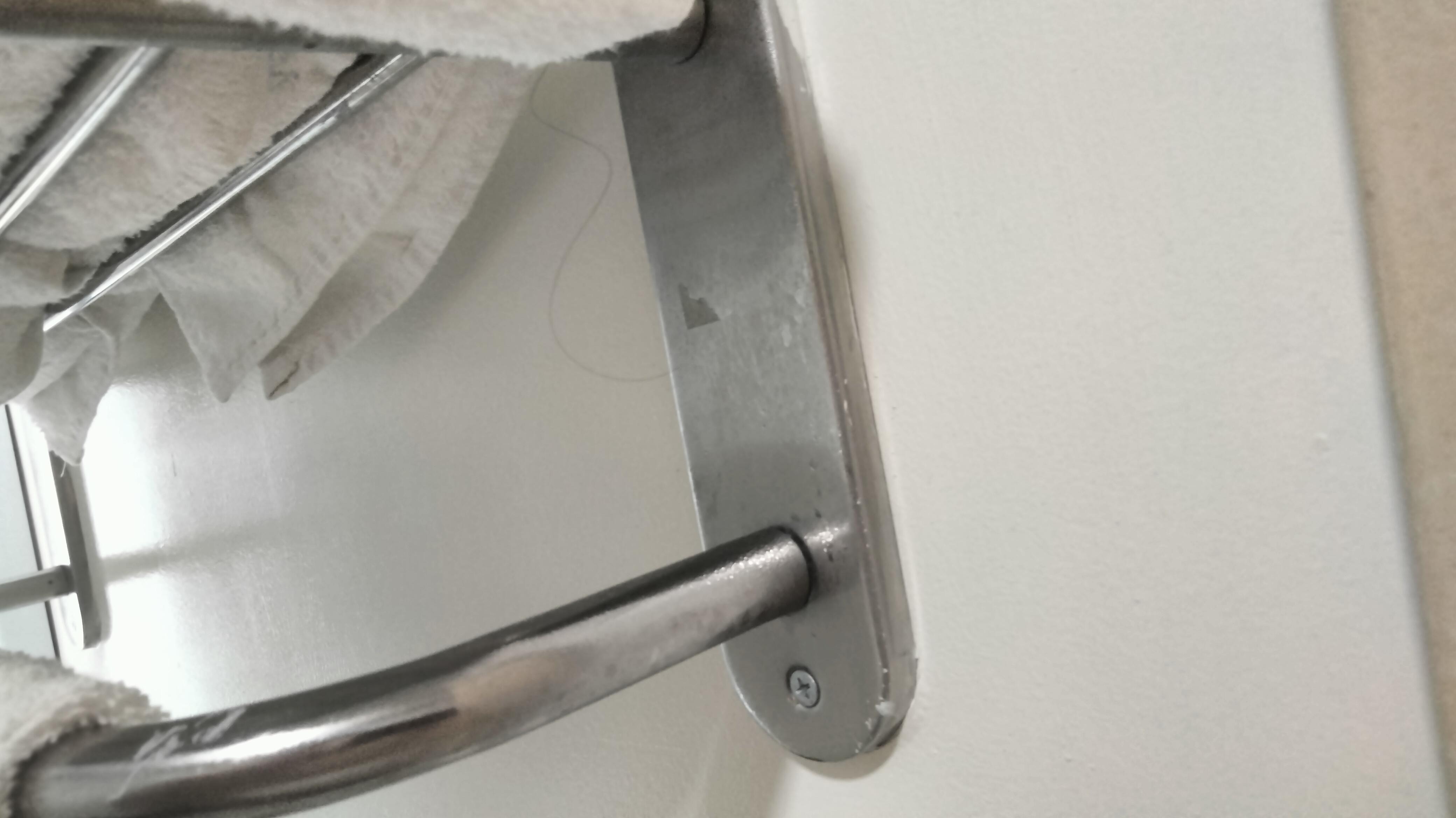 If you make the picture bigger, you can see the string of hair hanging from the bottom
