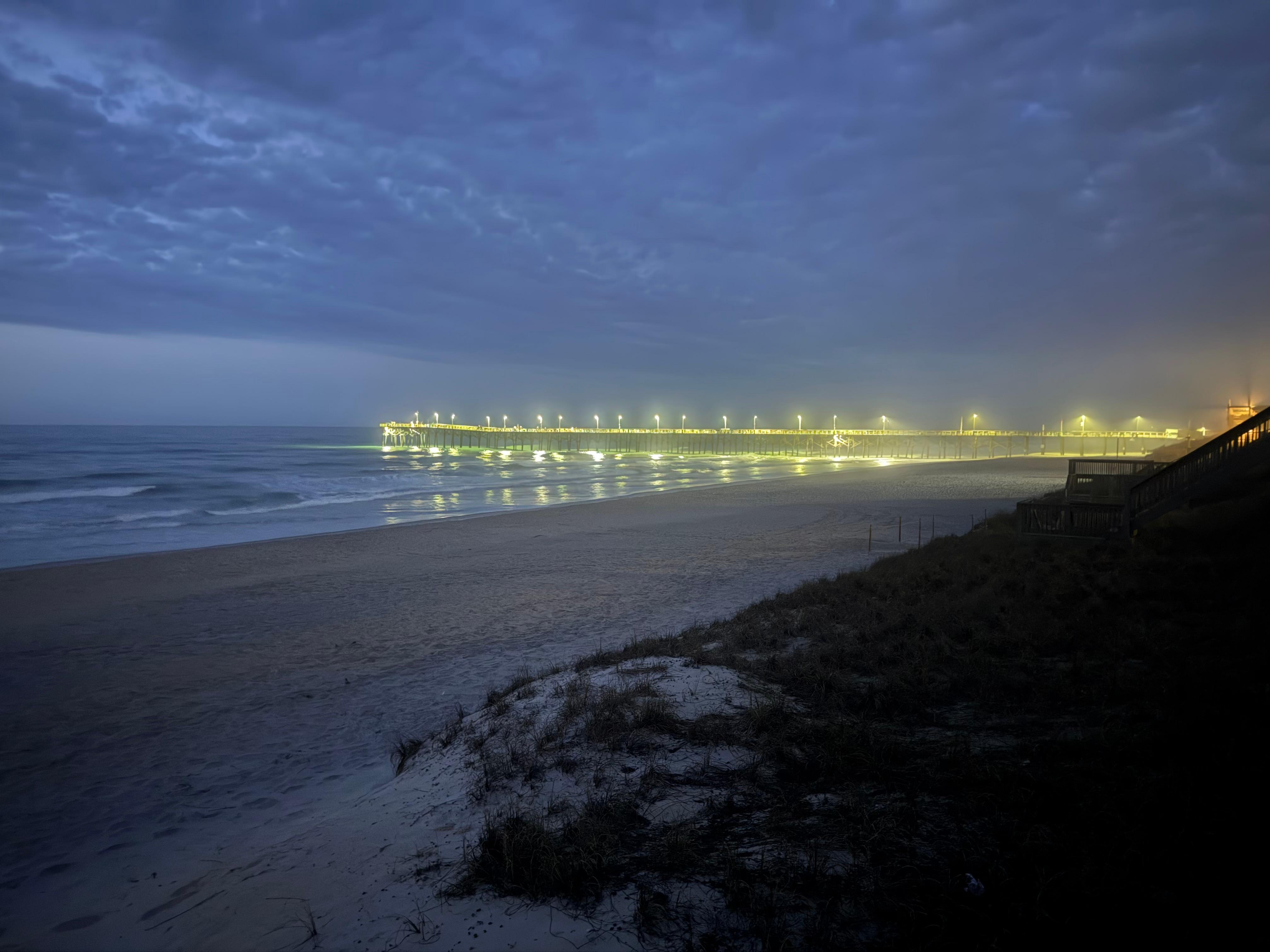 Pier seen from the porch lit up at night. Gorgeous.  