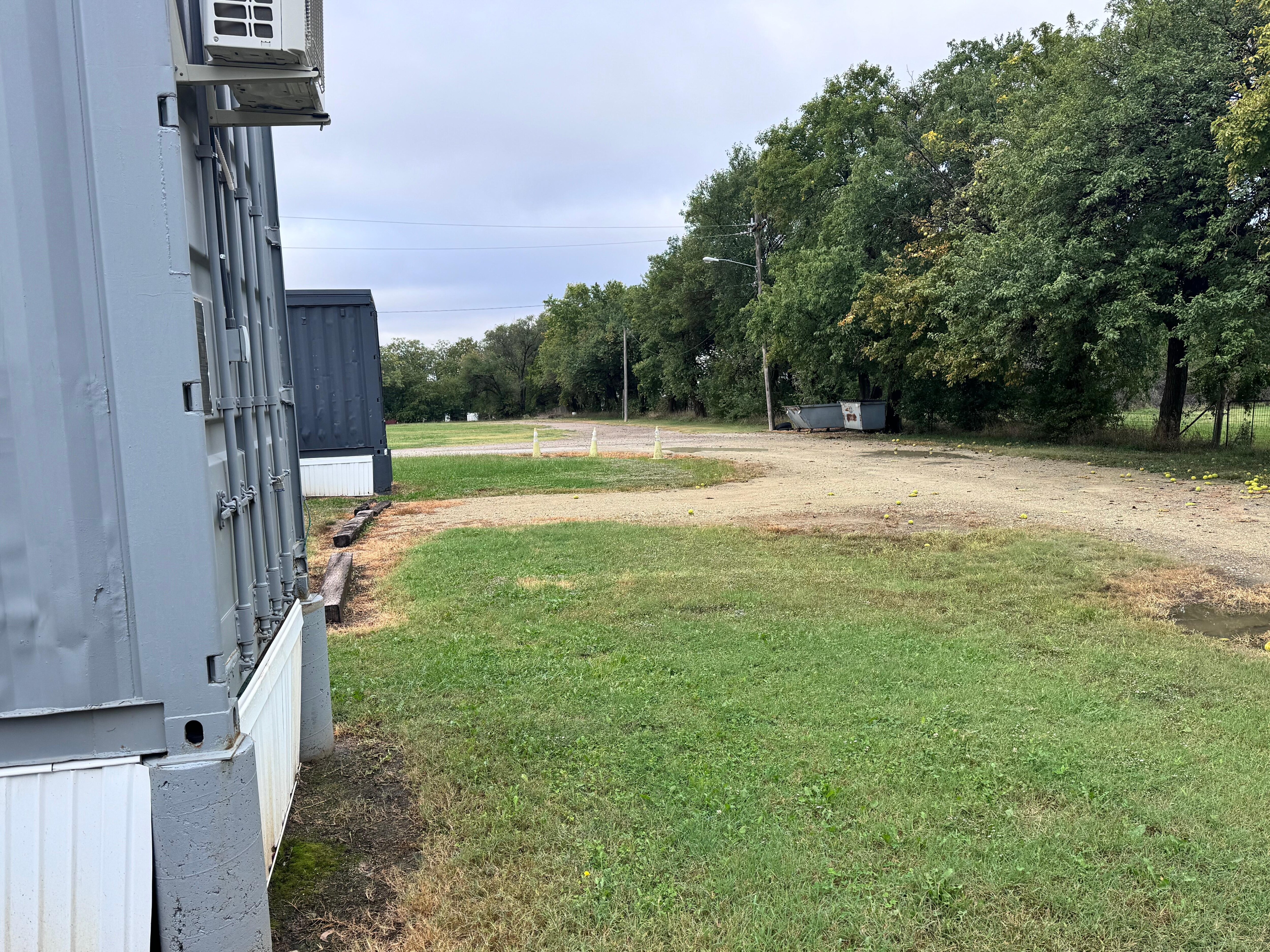 Property is in what looks like an abandoned mobile home park. Industrial feel. 