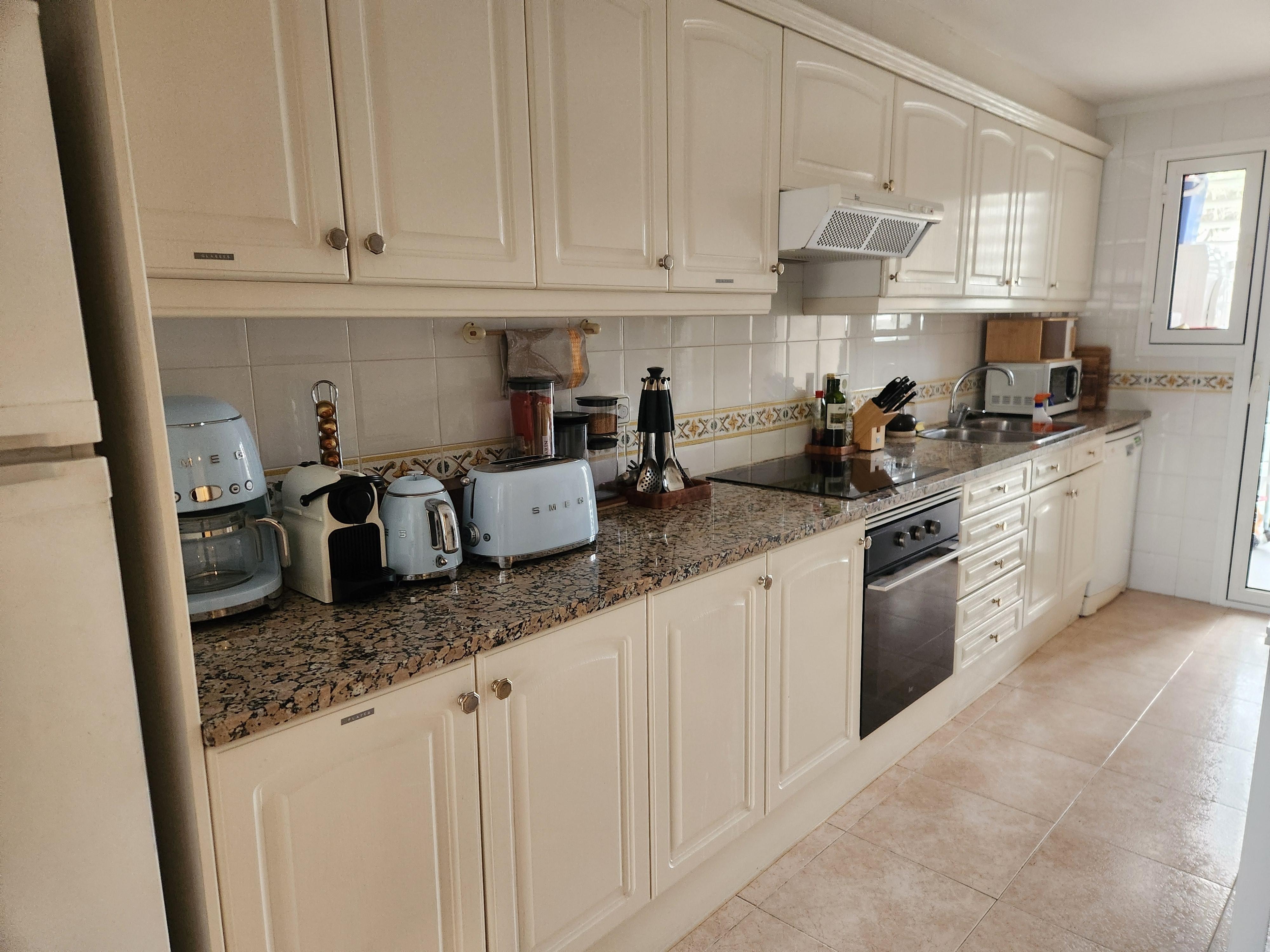 FULLY equipped kitchen, including olive oil, spices, coffee, tea, milk, wine and a basket of snacks!   Even multiple types of coffee makers