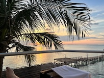 View from patio in the villas. Amazing sunsets every night from the west side (east side gets sunrise and sound of crashing waves).