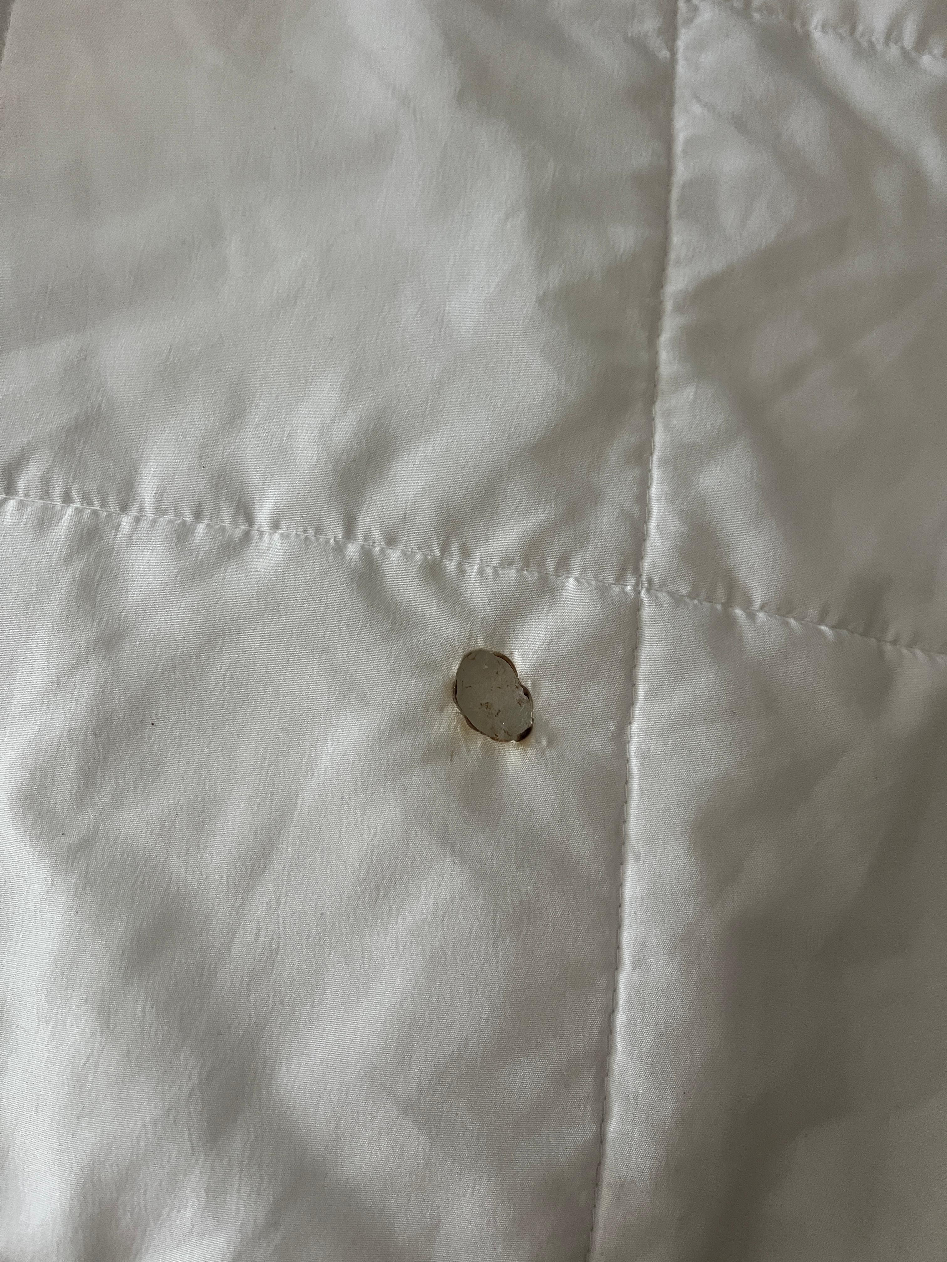 Cigarette burn on comforter