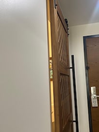The gap in the bathroom door