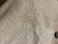 Towel with pieces of dirt