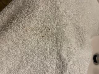 Towel with pieces of dirt