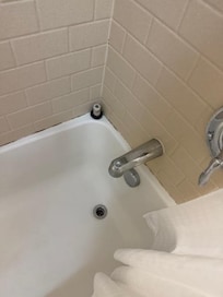 Mold and tub in disrepair.