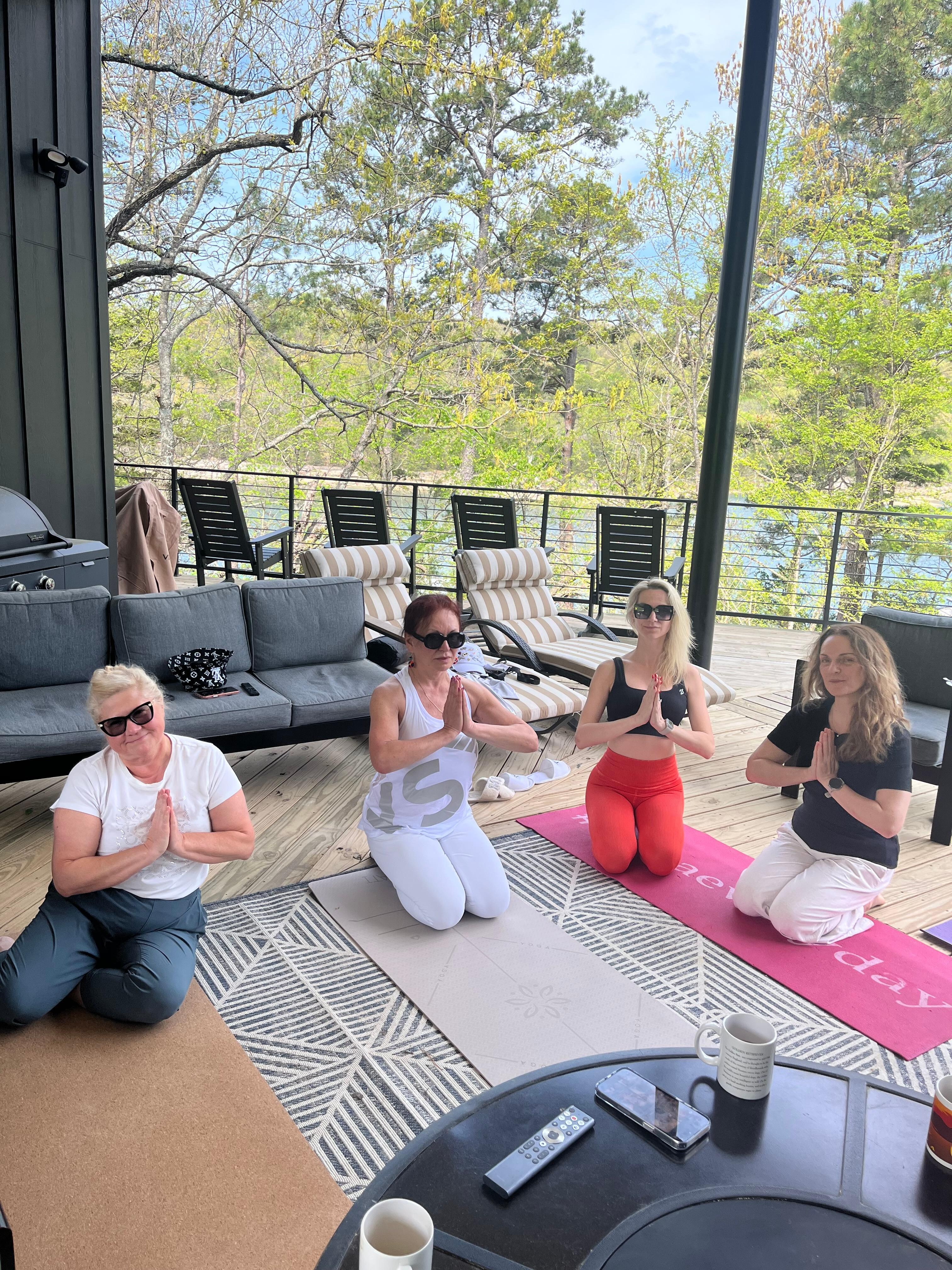 Doing yoga, on the deck.
