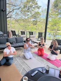 Doing yoga, on the deck.