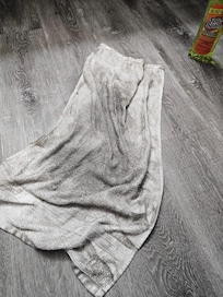 Towel used to clean dirt from the floor
