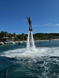 Our teenage grandson, Brett on the fly-board.