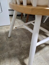 This chair was broken as well as the coffee table (which was cracked underneath). The "night table'" in the bedroom was a TV tray.