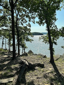 Rocky area at water’s edge below the house